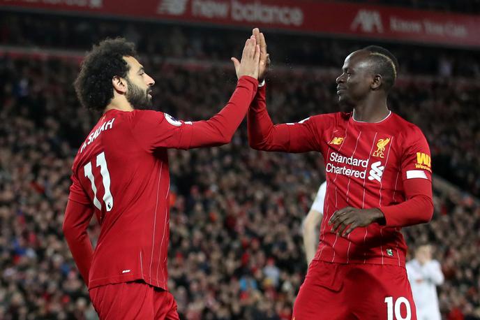 Mohamed Salah, Sadio Mane | Mohamed Salah in Sadio Mane se na treningih Liverpoola še nekaj časa ne bosta mogla tako pozdravljati. | Foto Reuters