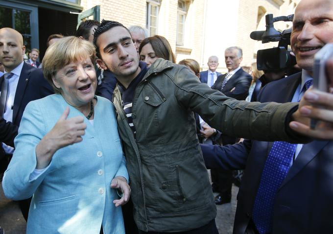 Nemška kanclerka Angela Merkel med prosilci za azil z Bližnjega vzhoda. | Foto: Reuters