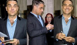 Robbie Williams kot George Clooney