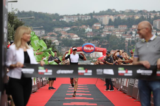 Poljak Michal Rajca bo v zgodovini zapisan kot prvi zmagovalec prvega ironmana 70.3 na slovenskih tleh.  | Foto: Grega Valančič/Sportida