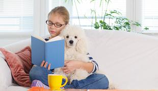 Psi otrokom pomagajo, da postanejo boljši bralci