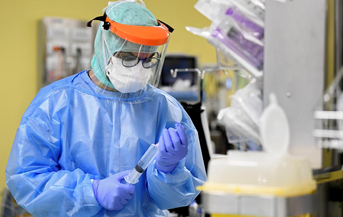 Italija koronavirus | V Lombardiji je z novim koronavirusom še vedno okuženih 20 tisoč ljudi. | Foto Reuters