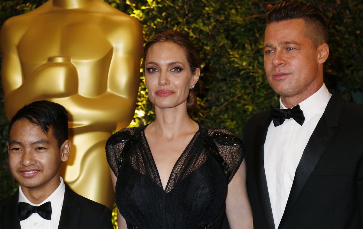Brad Pitt, Angelija Jolie, Maddox Jolie Pitt | Foto Reuters