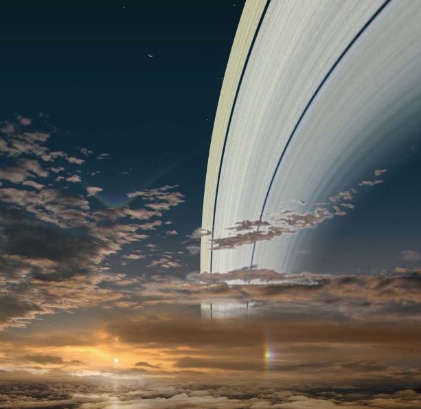 Sonce, kot bi ga videli iz zgornjih slojev Saturnove atmosfere. Desno zgoraj je Saturnov obroč, levo so njegove številne lune. Največja, viden je le krajec, je Titan, sicer edina luna v Osončju z gosto atmosfero. Saturn je od Sonca oddaljen 1,43 milijarde kilometrov. | Foto: Ron Miller