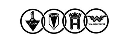 Prvi logotip novonastalega proizvajalca Auto Union. Vsak krog je pripadal določeni znamki vozil. | Foto: Audi