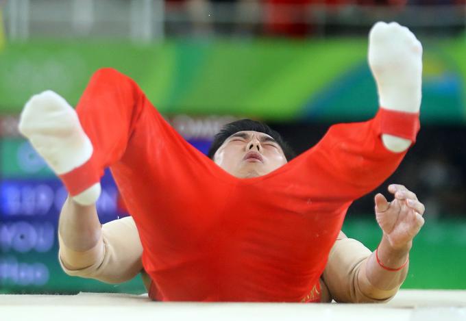Kitajski telovadci so prvič po igrah v Los Angelesu leta 1984 ostali brez zlatega olimpijskega odličja. | Foto: Reuters