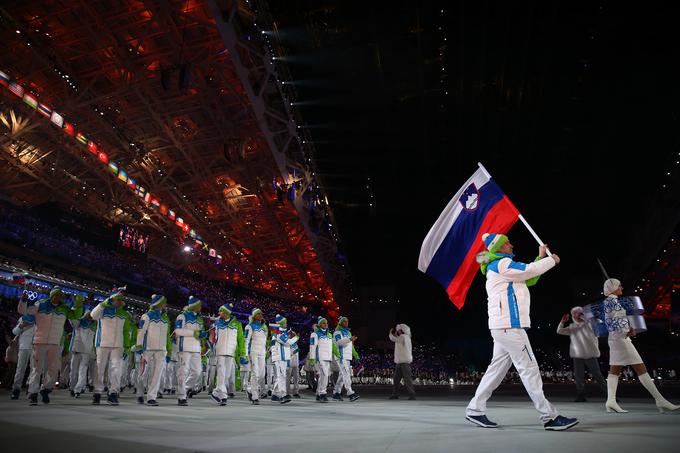 Vodja slovenskih navijačev bo nekdanji hokejist Tomaž Razingar, ki je leta 2014 v Sočiju nosil slovensko zastavo. | Foto: Getty Images