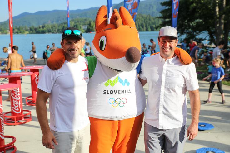 OKS-ZŠZ je s Tomažem Razingarjem in Juretom Koširjem na Nočni 10ki pripravil Olimpijski izziv.  | Foto: 