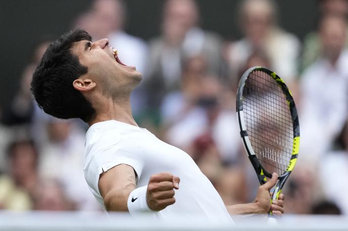 Carlos Alcaraz | Carlos Alcaraz je v Wimbledonu zmagal še drugič zaporedoma, ko je povsem nadigral Novaka Đokovića. | Foto Guliverimage