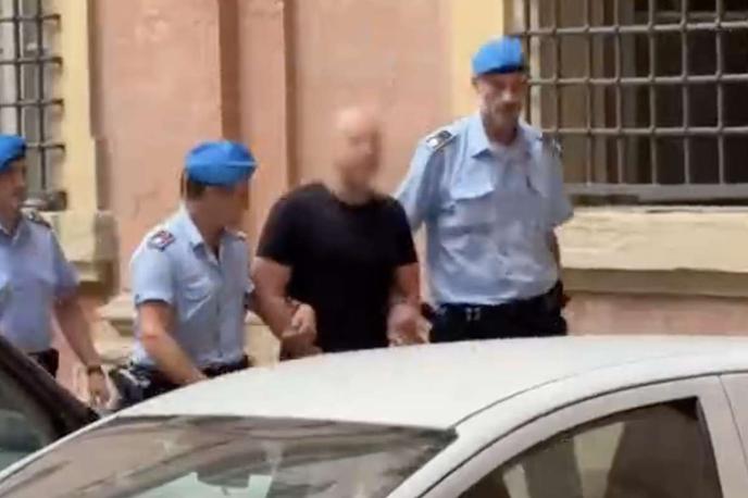 Sergij Kuznecov | Sergij Kuznecov v spremstvu italijanskih policistov. Od avgusta je priprt v enemu najstrožje varovanih zaporov v Italiji, kjer so med drugim zaprti tudi pripadniki teroristične organizacije Islamska država.  | Foto Profimedia