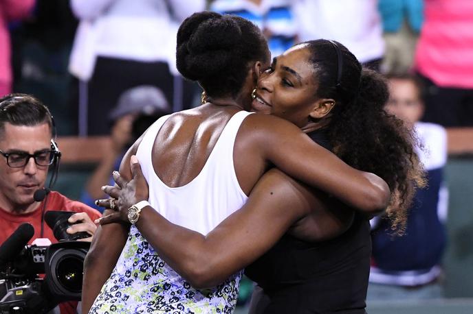 Serena in Venus Williams | Venus in Serena Williams bosta skupaj zaigrali v Wimbledonu. | Foto Guliver/Getty Images