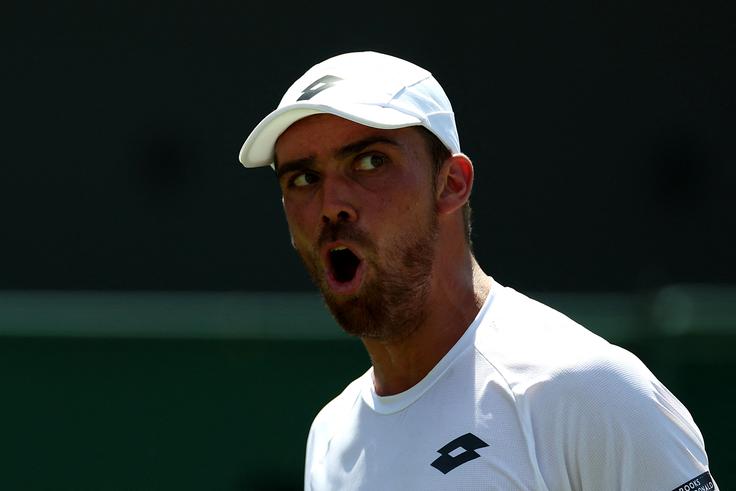 Benjamin Bonzi je pripravil presenečenje prvi dan Wimbledona. | Foto: Reuters