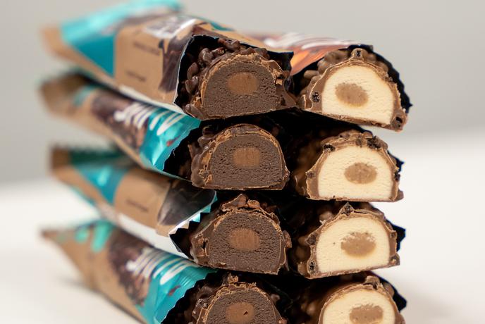 Hrustljave, kremaste in brez slabe vesti: nove proteinske ploščice osvajajo Slovenijo!