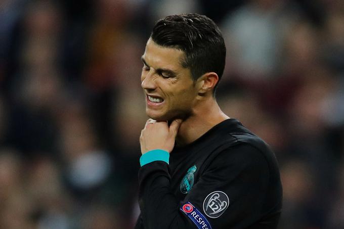Cristiano Ronaldo je polovico vseh zadetkov v tej sezoni dosegel proti Apoelu in Borussii. Samo enega je dal v španskem prvenstvu, Lionel Messi pa je že pri številki 12. | Foto: Reuters
