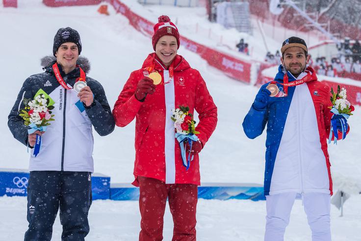 Na zadnjih olimpijskih igrah si je zmagovalni oder delil z Marcom Odermattom in Žanom Kranjcem. | Foto: Guliverimage