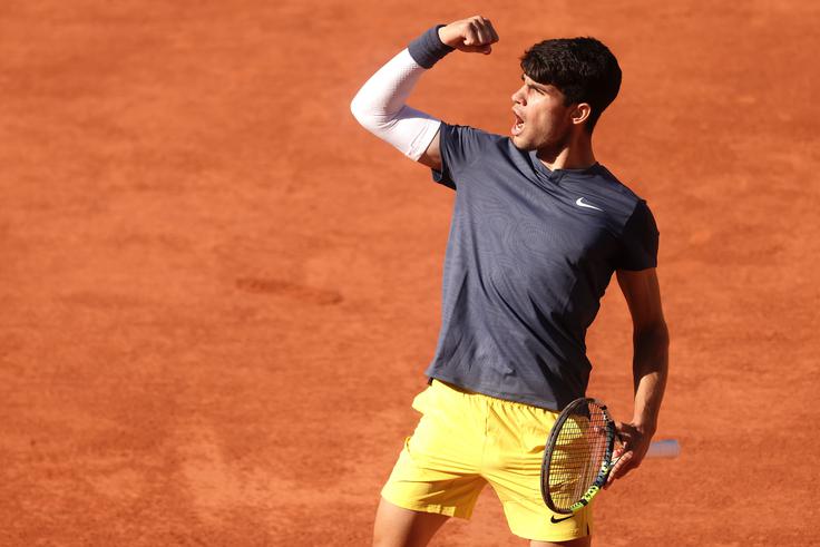 Carlos Alcaraz je postal šele sedmi igralec in hkrati tudi najmlajši, ki je zmagal turnirje za grand slam na vseh treh podlagah. | Foto: Guliverimage