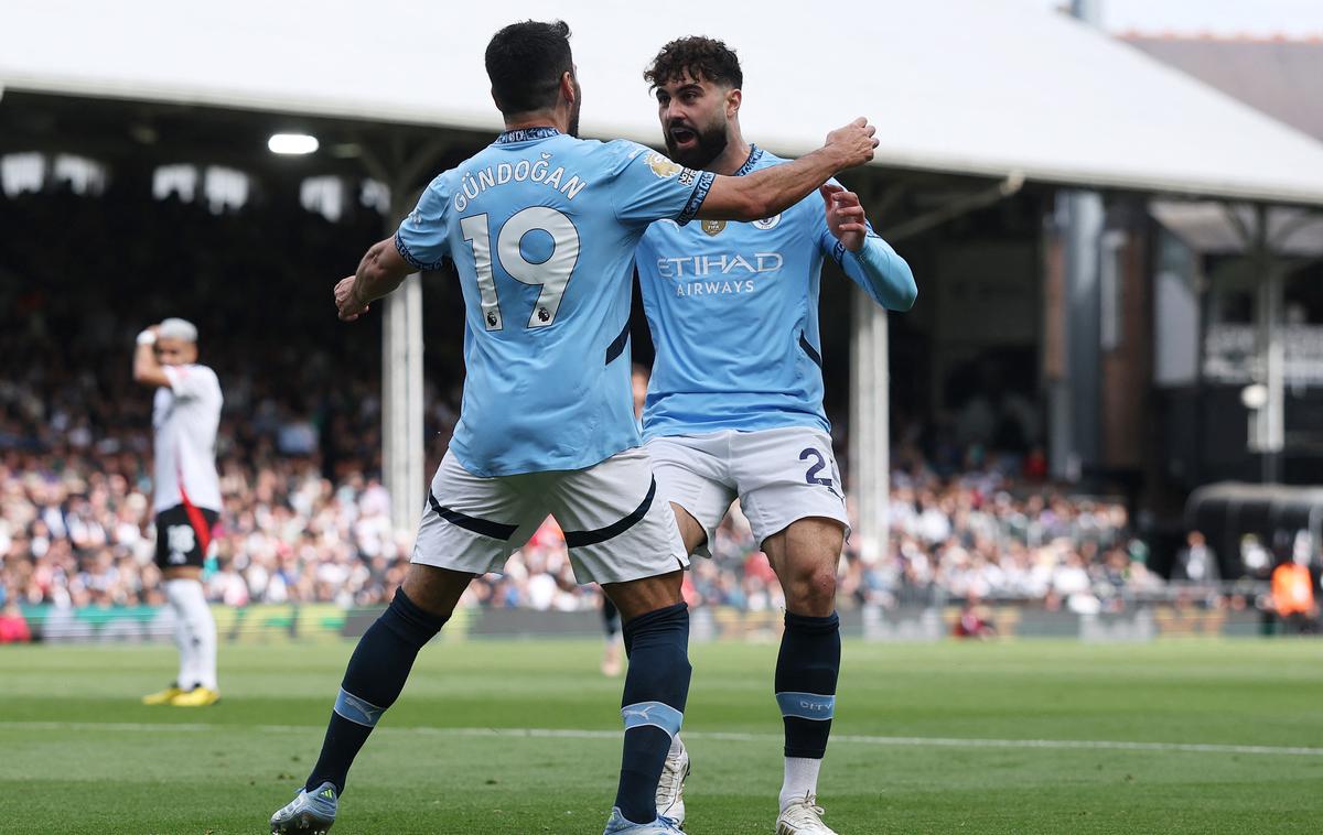 Fulham Manchester City Ilkay Gundogan |  Ilkay Gundogan je popeljal Manchester City v vodstvo v Londonu. Tako se je veselil zadetka skupaj s Hrvatom Joškom Gvardiolom. | Foto Reuters