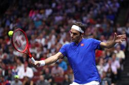 Federer v Chicagu brez napake, poraz Đokovića