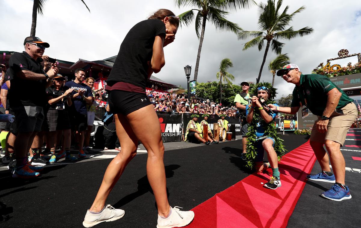 Patrick Lange Havaji ironman 2018 | Nemški triatlonec Patric Lange je slavje v cilju svetovnega prvenstva v ironmanu na Havajih izkoristil za novo slavje: svoje dekle je zaprosil za roko in dobil pritrdilni odgovor. | Foto Getty Images