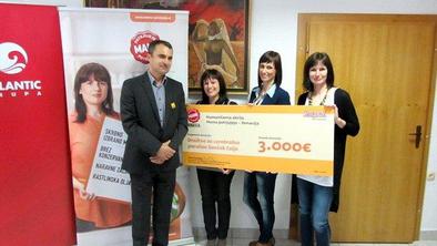 Argetina donacija v rokah društva Sonček Celje
