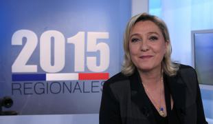 Rekorden uspeh skrajne desnice na volitvah v Franciji