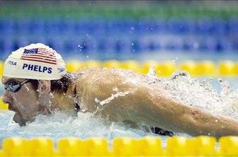 Phelps le za las zgrešil svetovni rekord