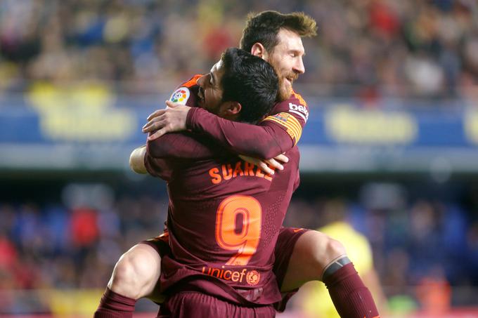 Veselje južnoameriških sosedov Lionela Messija in Luisa Suareza po zmagi na Madrigalu. | Foto: Reuters