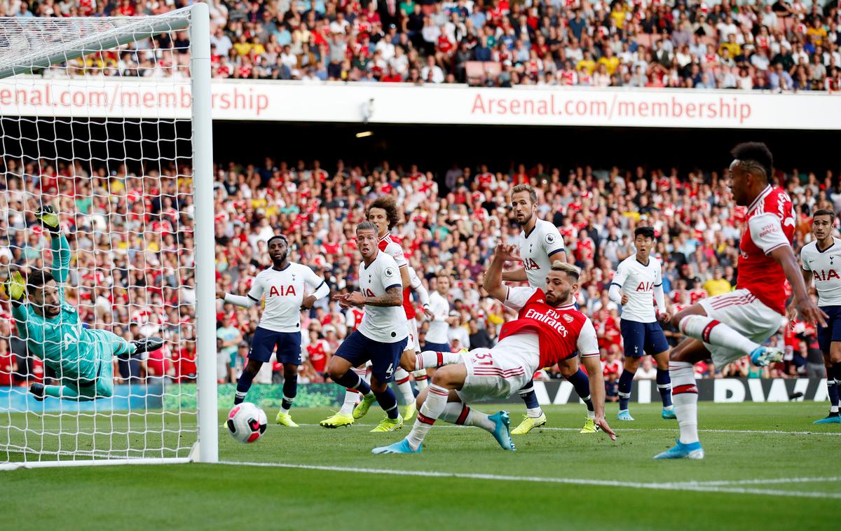 Arsenal Tottenham | Arsenal je proti Tottenhamu zaostajal z 0:2, na koncu pa iztržil točko. | Foto Reuters