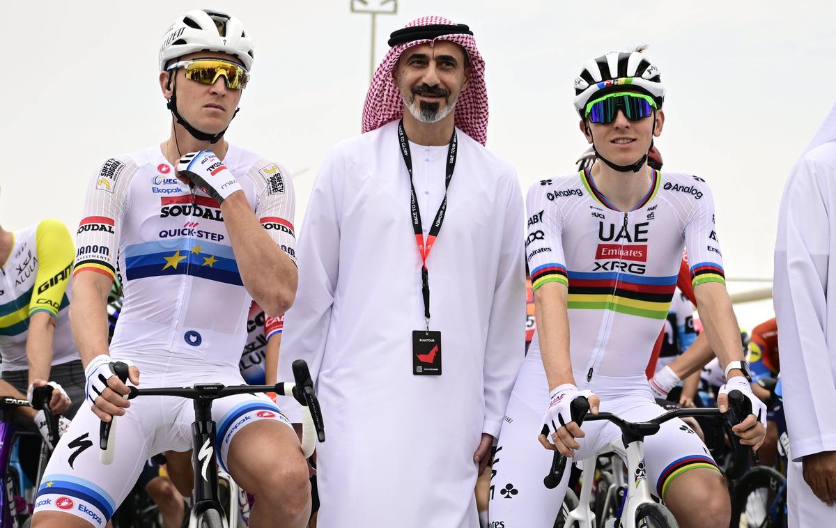 Tim Merlier, Tadej Pogačar, UAE Tour 2025 | Tim Merlier in Tadej Pogačar na štartu letošnje dirke po Združenih arabskih Emiratih. | Foto Guliverimage