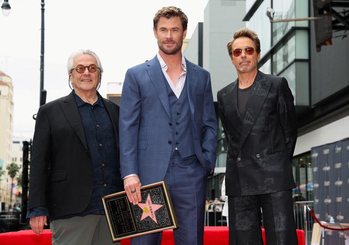 Režiser George Miller, Chris Hemsworth in Robert Downey Jr. | Foto: Reuters