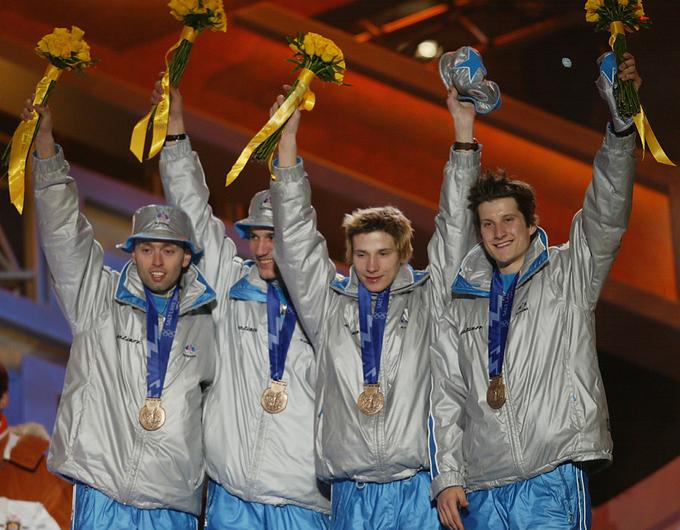 Fras, Žonta, Peterka in Kranjec so leta 2002 v Salt Lake Citiyju priskakali prvo skakalno olimpijsko medaljo po osamosvojitvi. | Foto: Reuters