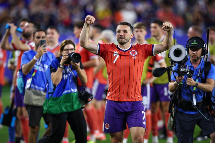 John McGinn je ponovno poskrbel za delirij med škotskimi navijači. | Foto: Guliverimage