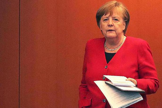 Angela Merkel | Ni napačno razumeti, kaj počne Vladimir Putin, in se postaviti v njegovo kožo, je prepričana Angela Merkel. To je po njenem mnenju temeljna naloga diplomacije in nekaj drugega kot podpora Putinu. | Foto Guliverimage/Vladimir Fedorenko