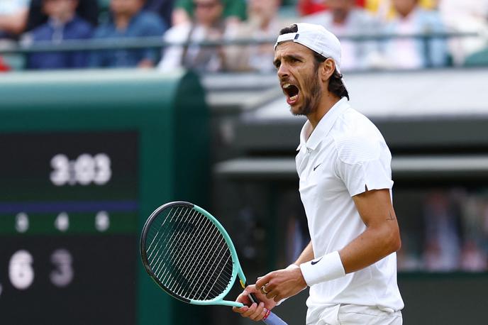 Lorenzo Musetti | Italijan Lorenzo Musetti je zadnji polfinalist teniškega turnirja za grand slam v Wimbledonu. V petek se bo v polfinalu meril z Novakom Đokovićem. | Foto Reuters