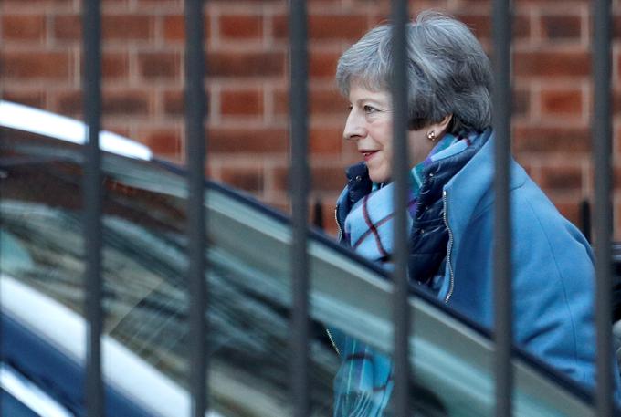 Britanska premierka Theresa May si prizadeva, da bi poslanci še tretjič zapored glasovali o ločitvenem sporazumu med Londonom in Brusljem. | Foto: Reuters