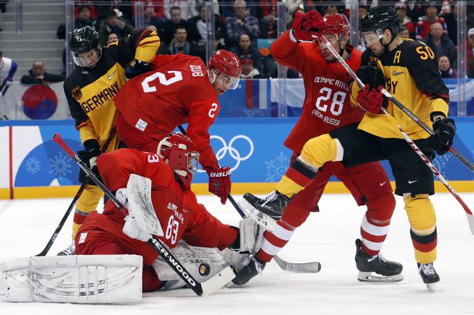 Rusija Nemčija finale OI Pjongčang | Pri Mednarodni hokejski zvezi pravijo, da obstajajo štiri možnosti za hokejski olimpijski turnir v Pekingu leta 2022. Črn scenarij predvideva, da hokeja sploh ne bi gledali, a vanj verjame le malokdo. | Foto Reuters