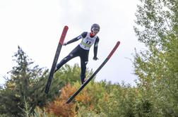 Trije slovenski skakalci do točk, še četrtič zmagal Aigner