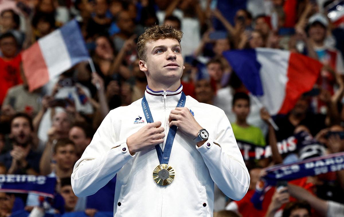Pariz 2024 plavanje Leon Marchand | Za največjo evforijo domačega občinstva je v prvem tednu iger v Parizu poskrbel Leon Marchand. | Foto Reuters