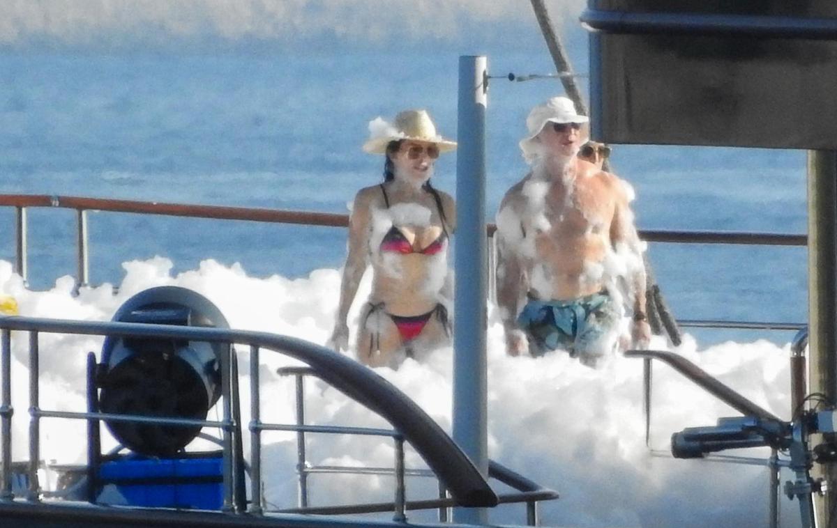 Jeff Bezos | Lauren Sanchez in Jeff Bezos sta bila na zabavi odlično razpoložena.  | Foto Pixsell/Sanjin Strukic