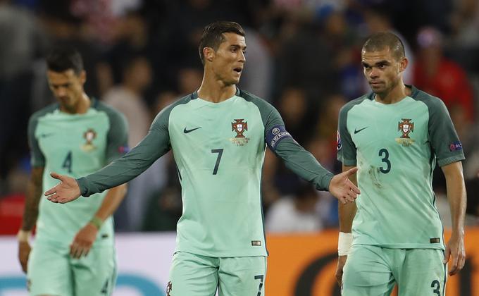 Cristiano Ronaldo in Pepe lahko le poldrugi mesec po zmagi v ligi prvakov osvojita še Euro. | Foto: 