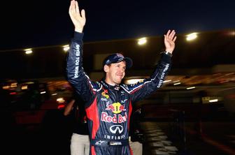 Vettel s popolno dirko ob bok velikemu Fangiu