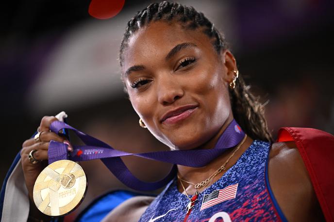 Tara Davis Woodhall | Olimpijska prvakinja Tara Davis Woodhall je na poti na trening doživela prometno nesrečo. | Foto Reuters