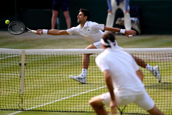 Epski dvoboj z Rogerjem Federerjem je trajal kar štiri ure in 57 minut. | Foto: Getty Images