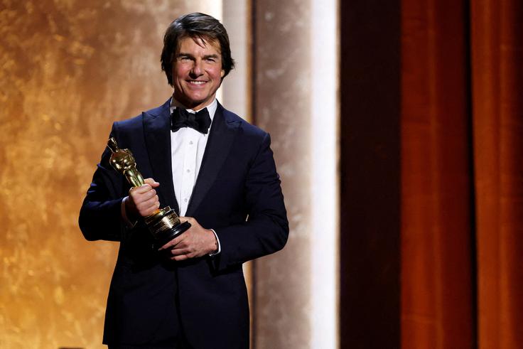 Tom Cruise je zaslovel s filmskimi uspešnicami, kot sta Misija nemogoče in Top Gun. | Foto: Reuters