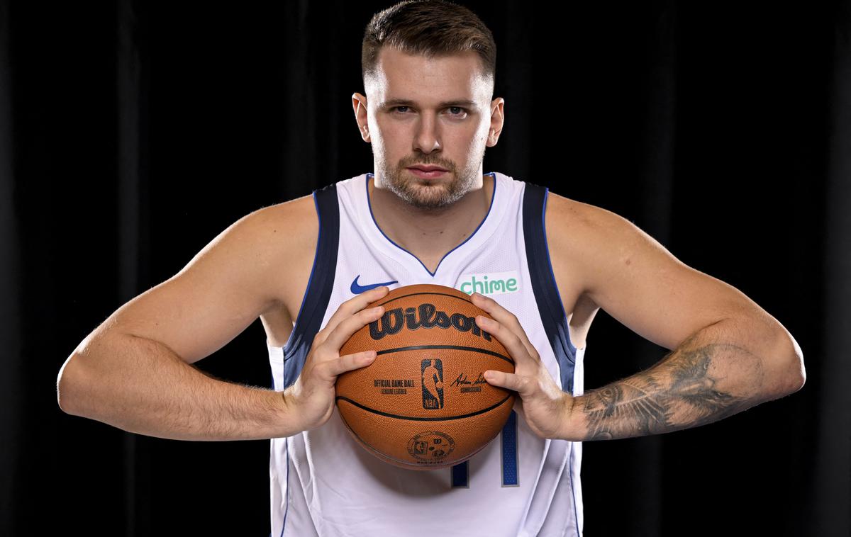 Luka Dončić | Luka Dončić si na lestvici najboljših strelcev lige NBA deli prvo mesto. | Foto Reuters