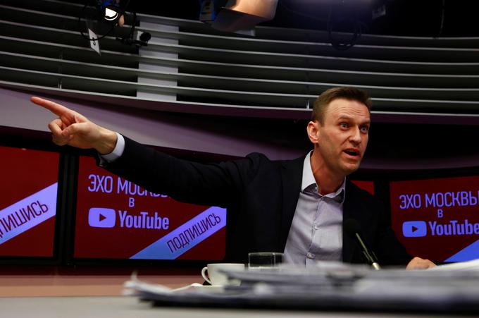 Opozicijski voditelj Aleksej Navalni se zaradi pogojne kazni ne sme potegovati za položaj ruskega predsednika. | Foto: Reuters