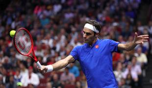 Federer v Chicagu brez napake, poraz Đokovića