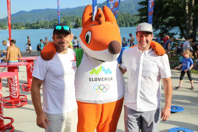OKS-ZŠZ je s Tomažem Razingarjem in Juretom Koširjem na Nočni 10ki pripravil Olimpijski izziv.  | Foto: 