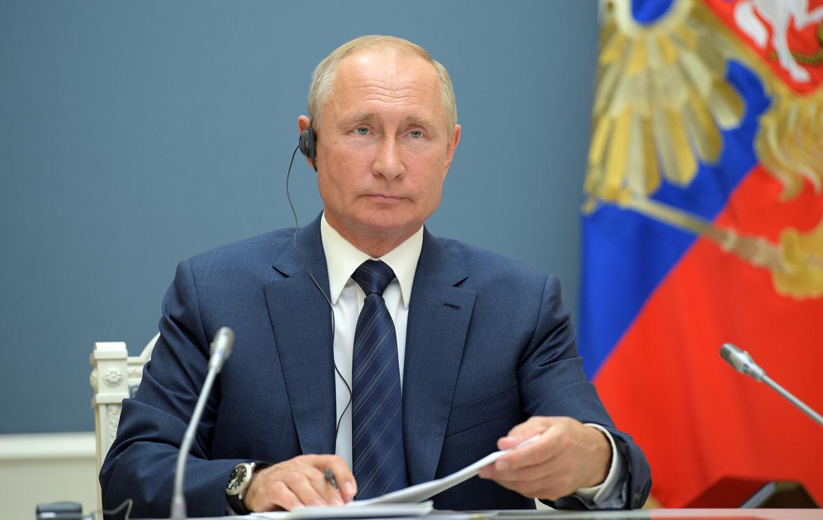 Vladimir Putin | "Upam, da bo vse v redu in da se bo Sputnik V v praksi izkazal kot visoka raven zaščite pred covidom-19," je dejal Putin.  | Foto Reuters