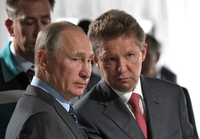Ruski predsednik Vladimir Putin in prvi mož Gazproma Aleksej Miller. | Foto: Reuters